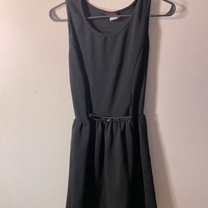 Black flare dress with gold belt